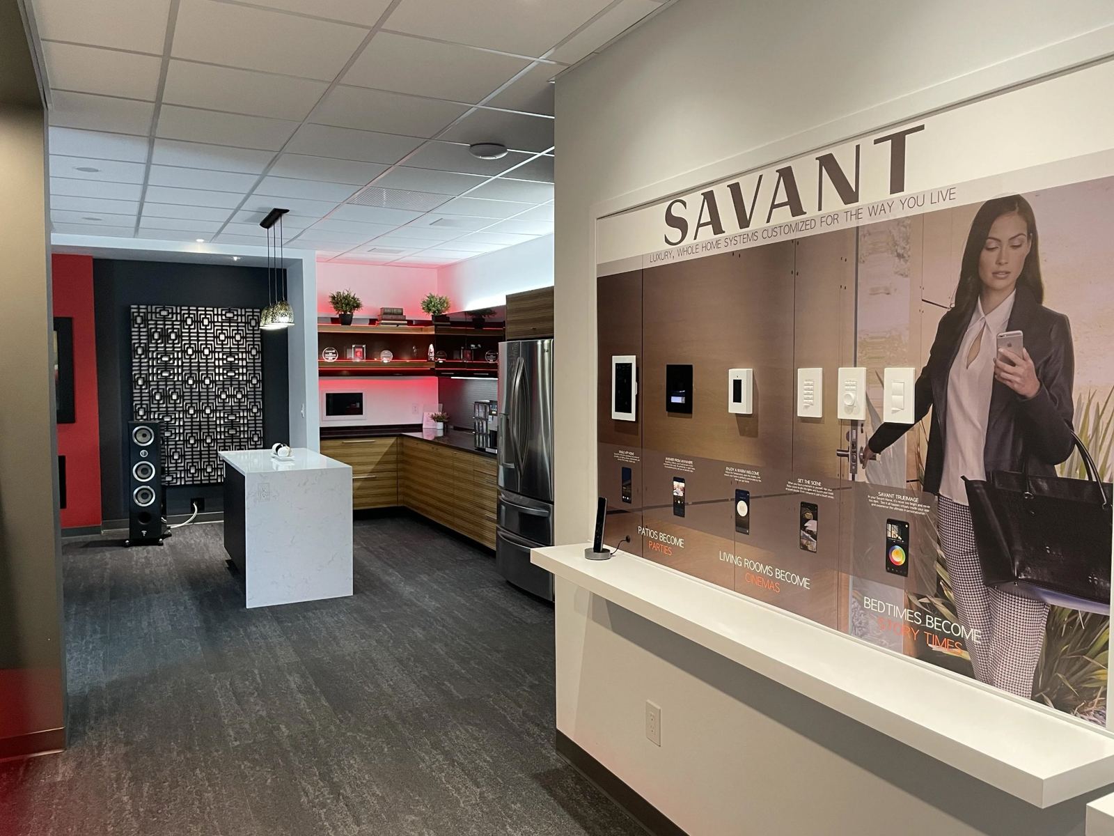 Savant smart home display wall and kitchen vignette in the Saskatoon Experience Center